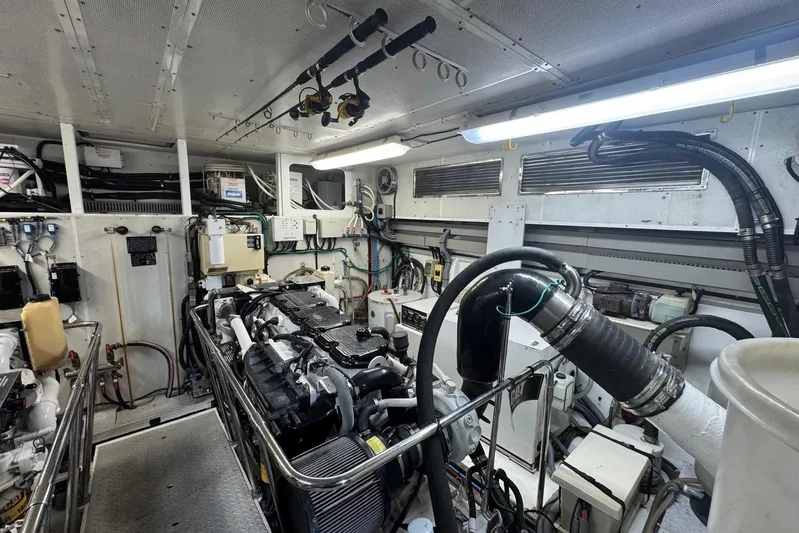  Yacht Photos Pics Engine room of 2003 Hargrave Open Bridge yacht, featuring complex machinery and equipment.