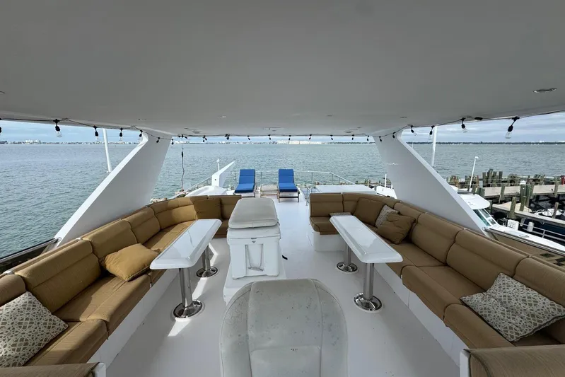  Yacht Photos Pics Luxurious 2003 Hargrave Open Bridge yacht with spacious seating and ocean view.