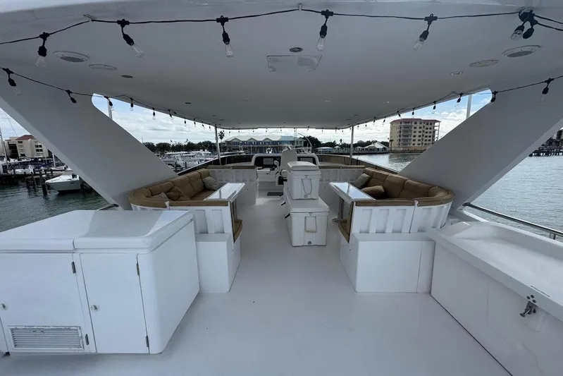  Yacht Photos Pics Luxurious 2003 Hargrave Open Bridge yacht with spacious seating and elegant design.