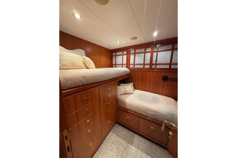  Yacht Photos Pics Luxurious 2003 Hargrave Open Bridge yacht cabin with wooden bunk beds and elegant design.