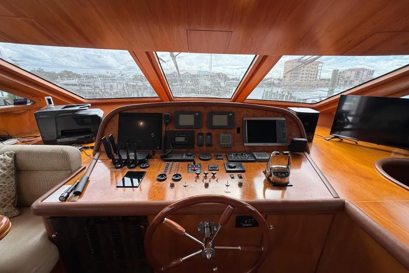  Yacht Photos Pics 2003 Hargrave Open Bridge yacht helm with navigation controls and panoramic windows.