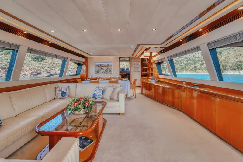  Yacht Photos Pics Luxurious interior of a 2006 Ferretti Yachts 830 with elegant seating and scenic views.