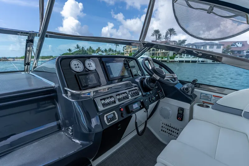  Yacht Photos Pics 2022 Formula 40 Performance Cruiser cockpit with modern navigation controls and luxurious seating.