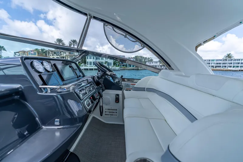  Yacht Photos Pics 2022 Formula 40 Performance Cruiser interior with modern dashboard and luxurious seating.