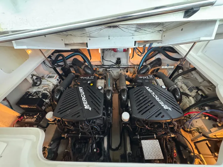 Finalize Yacht Photos Pics Engine compartment of a 2007 Sea Ray 340 Sundancer with twin Mercury engines.