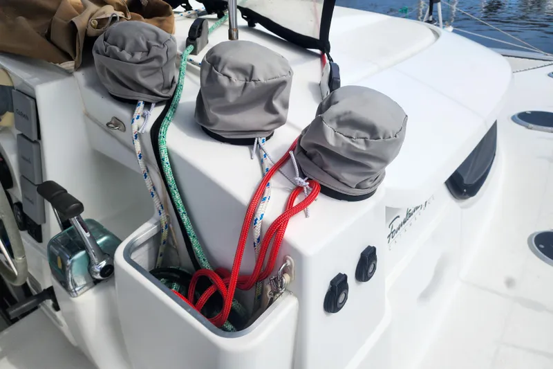 Benevah Yacht Photos Pics Deck of 2013 Fountaine Pajot Lipari 41 catamaran with ropes and winch covers.