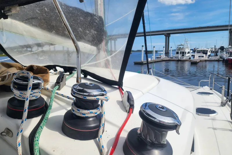 Benevah Yacht Photos Pics Fountaine Pajot Lipari 41 sailboat deck with winches and ropes, docked at marina, 2013 model.