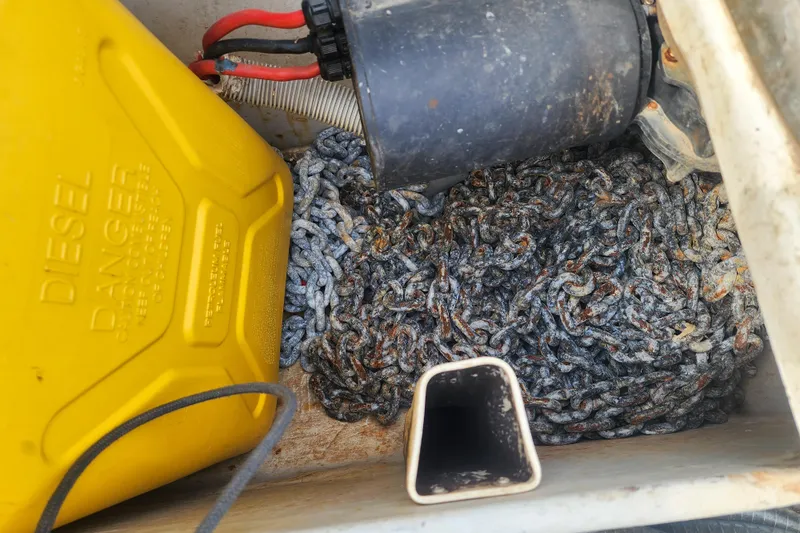 Benevah Yacht Photos Pics Yellow diesel container and rusty chains in a Fountaine Pajot Lipari 41, 2013 model.