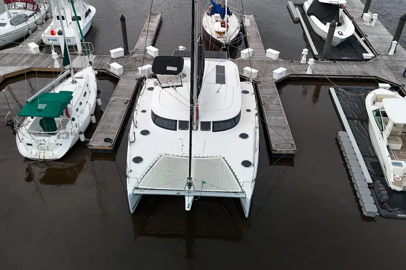 Benevah Yacht Photos Pics 2013 Fountaine Pajot Lipari 41 catamaran docked at a marina, aerial view.