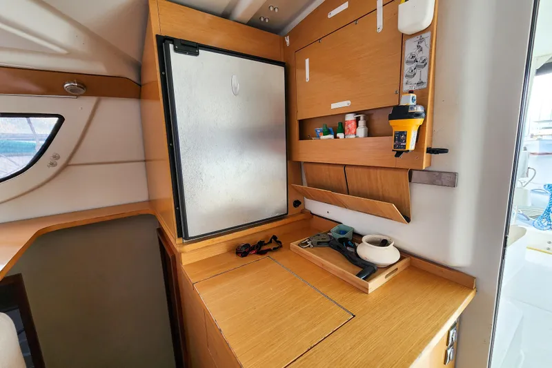 Benevah Yacht Photos Pics Interior of 2013 Fountaine Pajot Lipari 41 catamaran with storage and equipment.