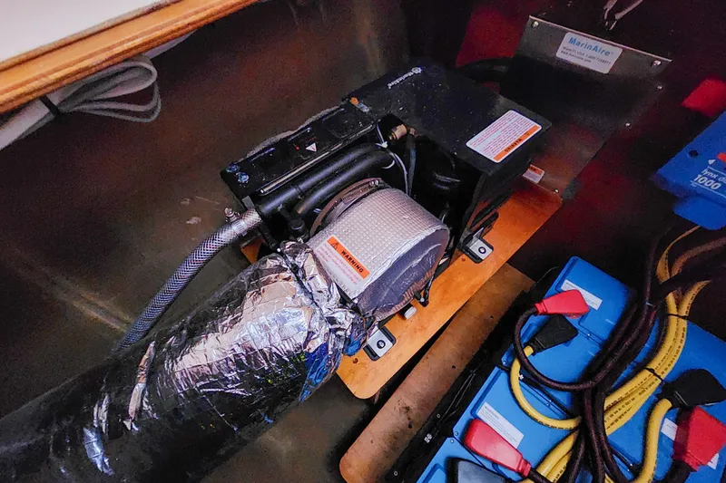 Benevah Yacht Photos Pics Engine room of 2013 Fountaine Pajot Lipari 41 with MarinAire equipment and batteries.