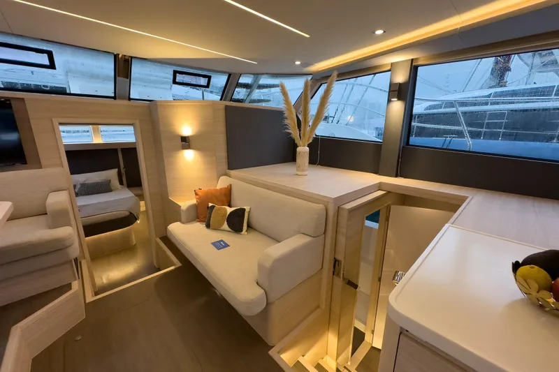  Yacht Photos Pics Luxurious interior of 2025 Aquila 50 Yacht with modern seating and elegant decor.