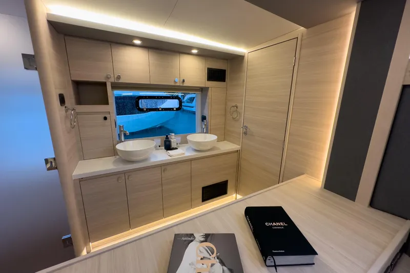  Yacht Photos Pics Luxurious bathroom interior of 2025 Aquila 50 Yacht with modern fixtures and elegant design.
