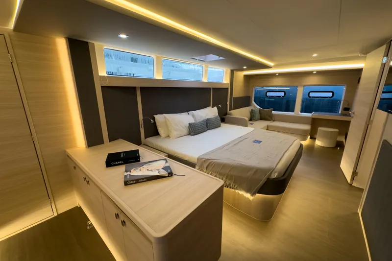  Yacht Photos Pics Luxurious interior of 2025 Aquila 50 Yacht with modern bedroom design and ambient lighting.