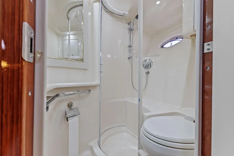  Yacht Photos Pics Luxurious bathroom in 2002 Sea Ray 550 Sundancer yacht with shower and toilet.