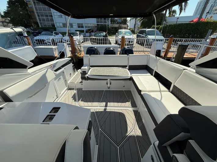  Yacht Photos Pics Interior of 2020 Monterey 385 Super Express boat with spacious seating and modern design.