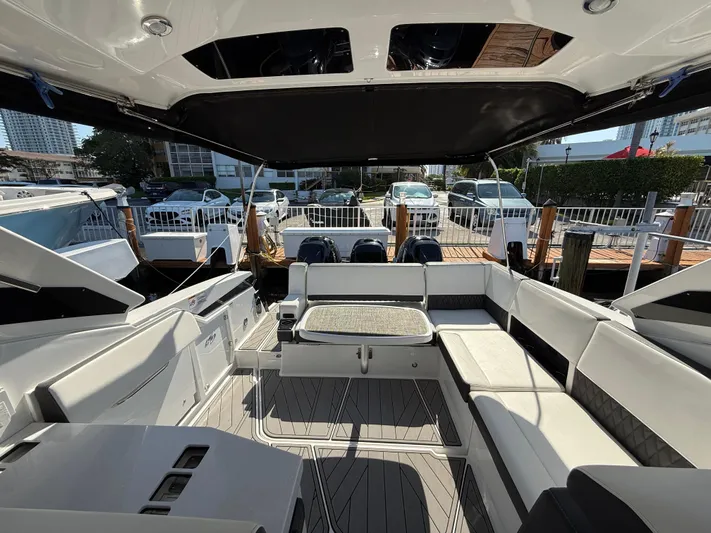  Yacht Photos Pics Luxurious 2020 Monterey 385 Super Express yacht interior with spacious seating and modern design.