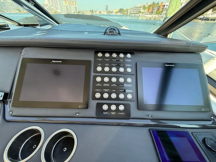  Yacht Photos Pics Dashboard of 2020 Monterey 385 Super Express with dual screens and control panel.