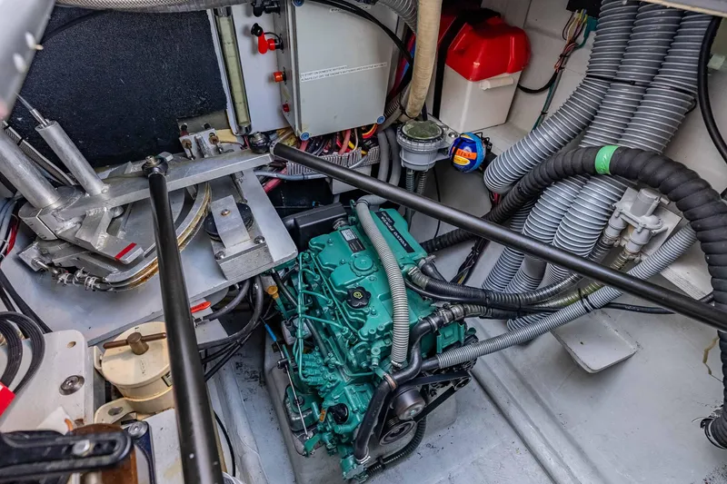  Yacht Photos Pics Engine room of 2014 Outremer 51 catamaran with visible wiring and components.