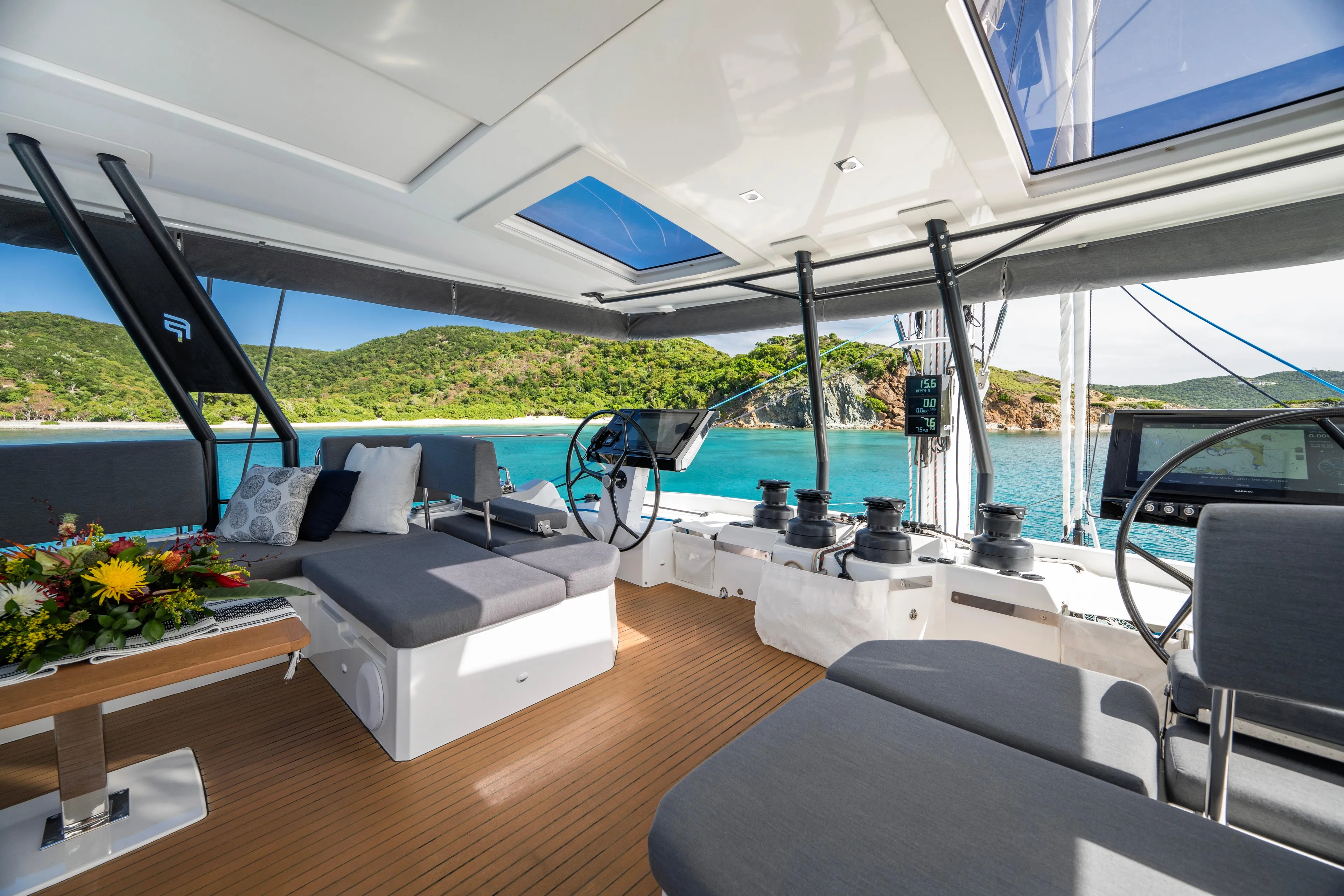 My Ty Yacht Photos Pics Luxurious 2021 Fountaine Pajot Catamaran Alegria 67 interior with scenic ocean view.