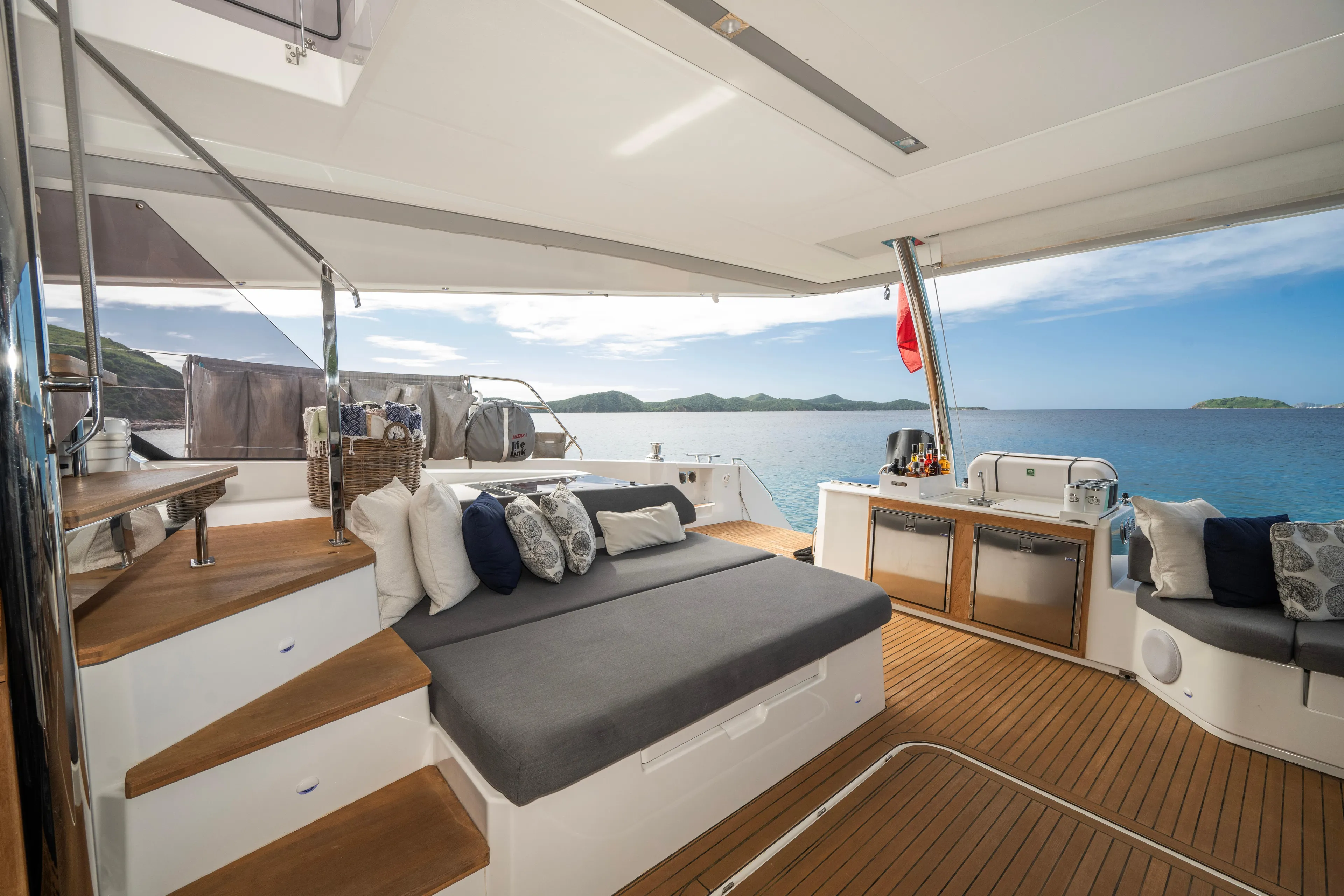 My Ty Yacht Photos Pics Luxurious 2021 Fountaine Pajot Catamaran Alegria 67 with spacious deck and scenic ocean view.