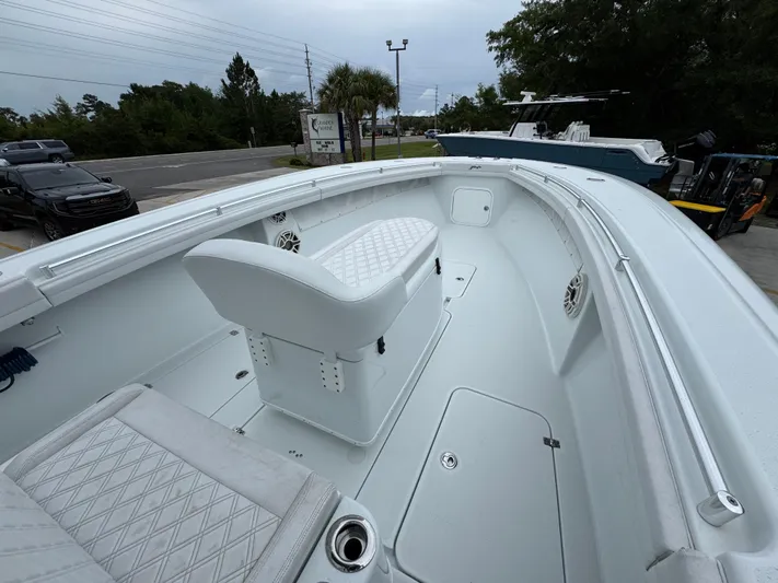  Yacht Photos Pics 2021 Yellowfin 36 Offshore boat interior with white seating and spacious deck.