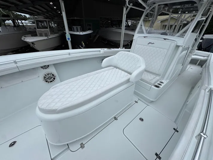  Yacht Photos Pics 2021 Yellowfin 36 Offshore boat interior with white seating and sleek design.