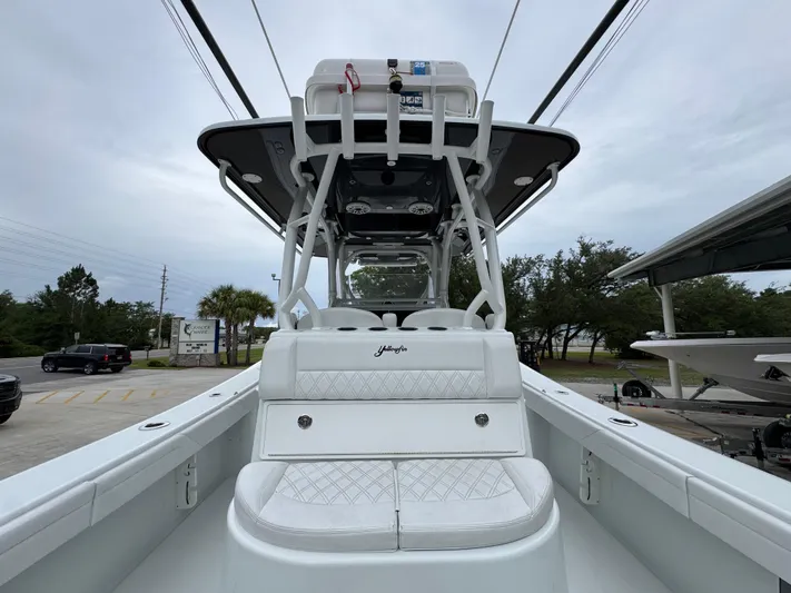  Yacht Photos Pics 2021 Yellowfin 36 Offshore boat with white seating and sleek design.