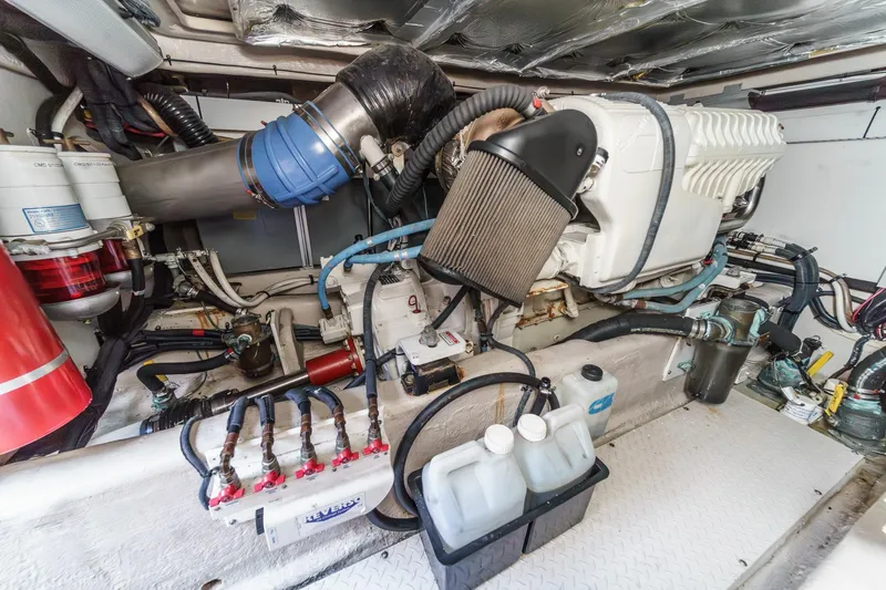  Yacht Photos Pics Engine room of 2005 Sea Ray 500 Sedan Bridge yacht, showcasing mechanical components and systems.