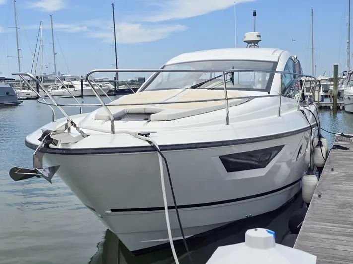 Rio Yacht Photos Pics 2019 Beneteau Gran Turismo 40 yacht docked at marina, clear sky background.