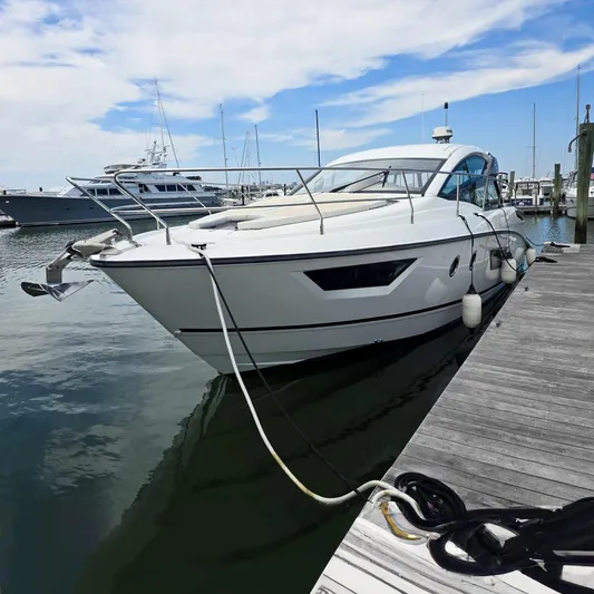 Rio Yacht Photos Pics 2019 Beneteau Gran Turismo 40 yacht docked at marina under blue sky.