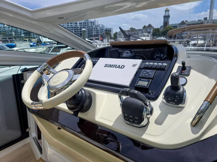 Rio Yacht Photos Pics Cockpit of 2019 Beneteau Gran Turismo 40 with steering wheel and navigation controls.