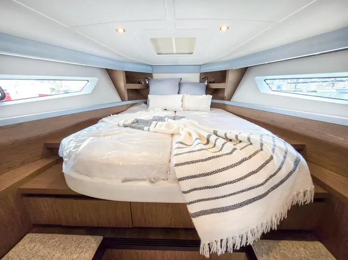 Rio Yacht Photos Pics Luxurious cabin interior of 2019 Beneteau Gran Turismo 40 yacht with cozy bedding.