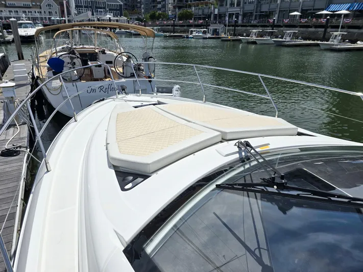 Rio Yacht Photos Pics 2019 Beneteau Gran Turismo 40 yacht docked in a marina, featuring a spacious sun deck.