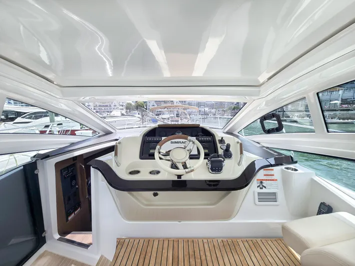 Rio Yacht Photos Pics Interior view of 2019 Beneteau Gran Turismo 40 yacht cockpit with modern controls.