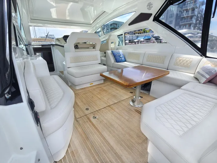 Rio Yacht Photos Pics Luxurious interior of 2019 Beneteau Gran Turismo 40 yacht with elegant seating and table.