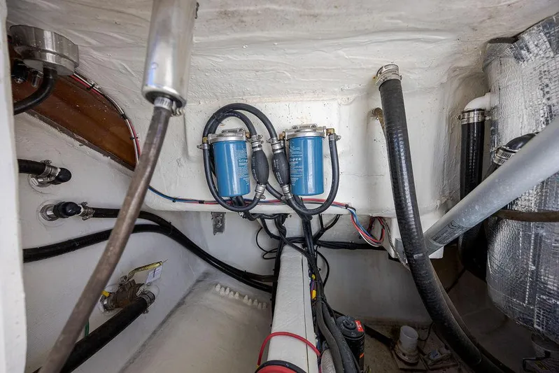 Compass Rose Yacht Photos Pics Engine compartment of 2020 Cobia 280 Center Console with fuel filters and hoses.