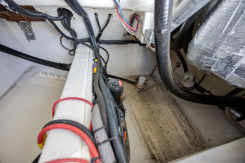 Compass Rose Yacht Photos Pics Interior wiring of 2020 Cobia 280 Center Console boat, showcasing cables and components.