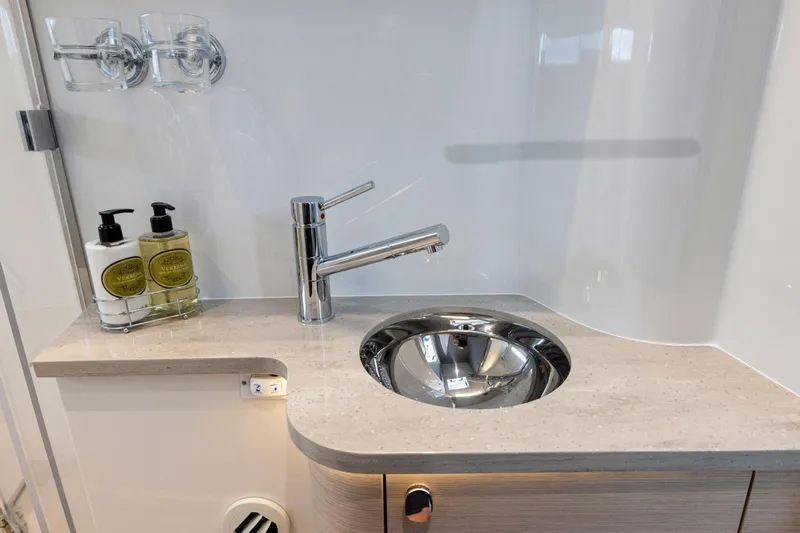  Yacht Photos Pics Luxurious bathroom sink area in 2026 Nimbus 495 Flybridge yacht.