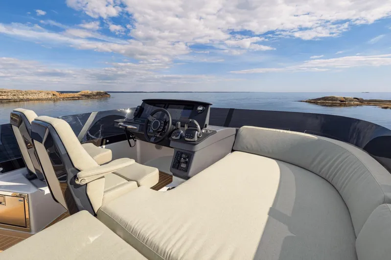  Yacht Photos Pics Luxurious 2026 Nimbus 495 Flybridge yacht interior with scenic ocean view.