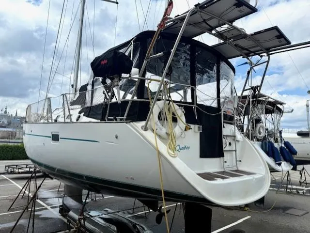 Spirit Bird Yacht Photos Pics 2004 Beneteau Oceanis 423 sailboat on dry dock, showcasing stern and deck features.