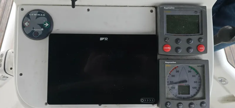 Spirit Bird Yacht Photos Pics Control panel of a 2004 Beneteau Oceanis 423 sailboat with navigation instruments.