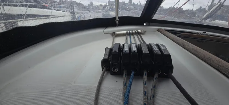 Spirit Bird Yacht Photos Pics 2004 Beneteau Oceanis 423 sailboat deck with rope clutches and lines.