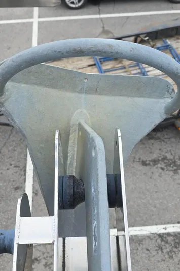 Spirit Bird Yacht Photos Pics Close-up of an anchor on a 2004 Beneteau Oceanis 423 sailboat.