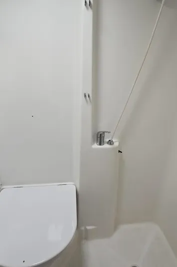 Spirit Bird Yacht Photos Pics Beneteau Oceanis 423 2004 yacht bathroom with shower and toilet.