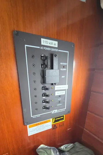 Spirit Bird Yacht Photos Pics AC power control panel on a 2004 Beneteau Oceanis 423 sailboat.