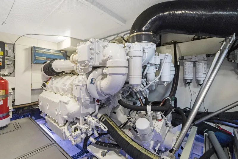 Aquasition Yacht Photos Pics Engine room of 2020 Galeon 680 Fly yacht, showcasing complex machinery and components.