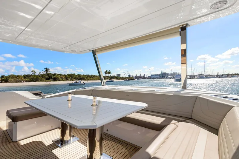 Aquasition Yacht Photos Pics Luxurious 2020 Galeon 680 Fly yacht interior with elegant seating and scenic ocean view.