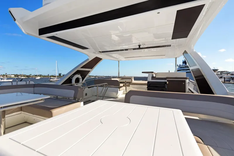 Aquasition Yacht Photos Pics Luxurious 2020 Galeon 680 Fly yacht deck with seating and ocean view.