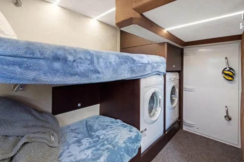 Aquasition Yacht Photos Pics Interior of 2020 Galeon 680 Fly yacht with bunk beds and laundry appliances.